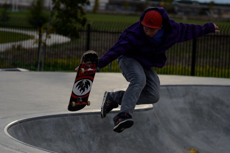 Skater Performing Trick — Purple
