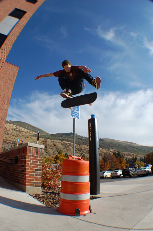 Skater performs trick mid-air