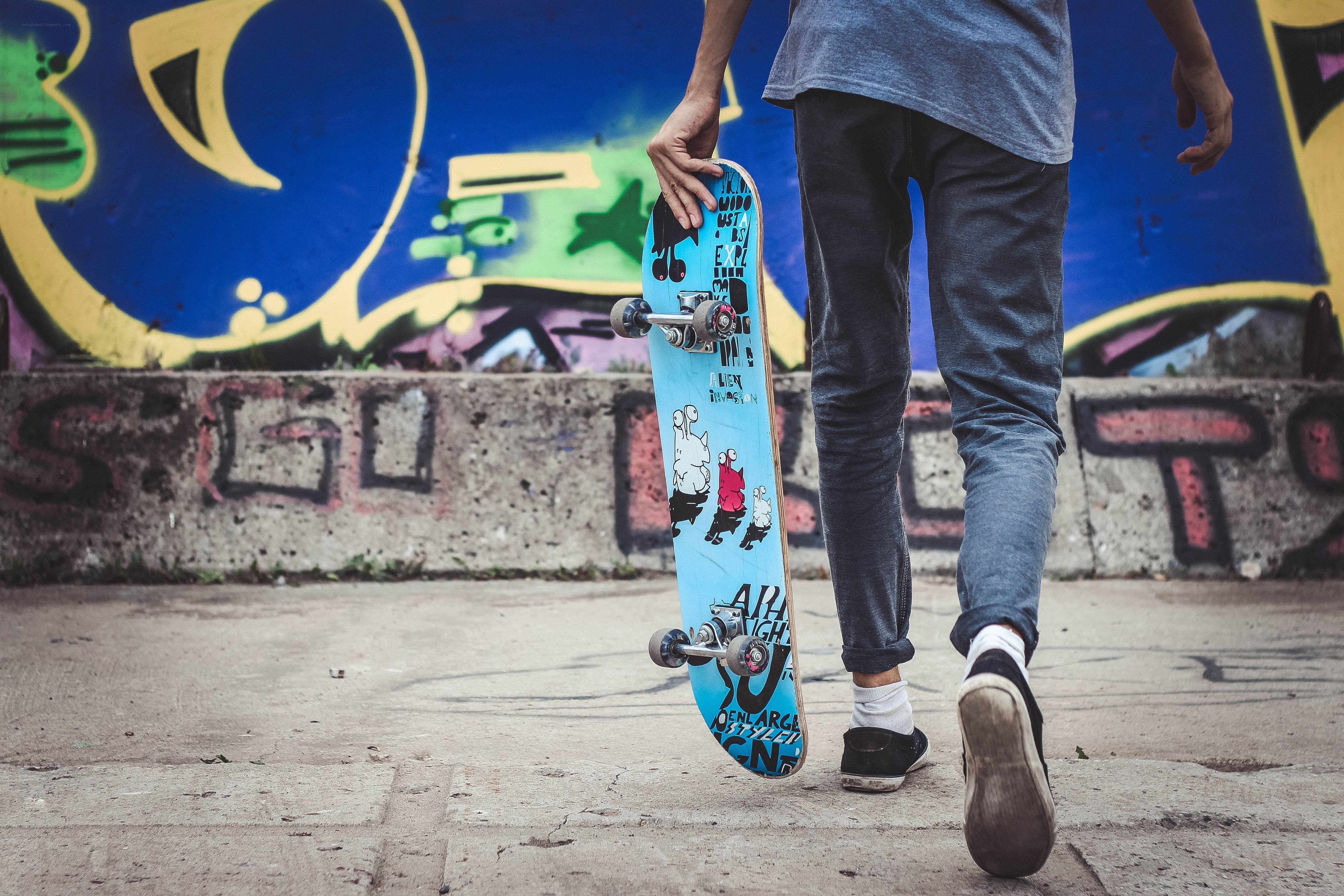 Skater walking with board