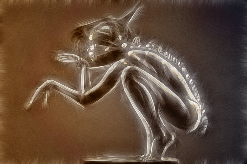 skeletal alien figure