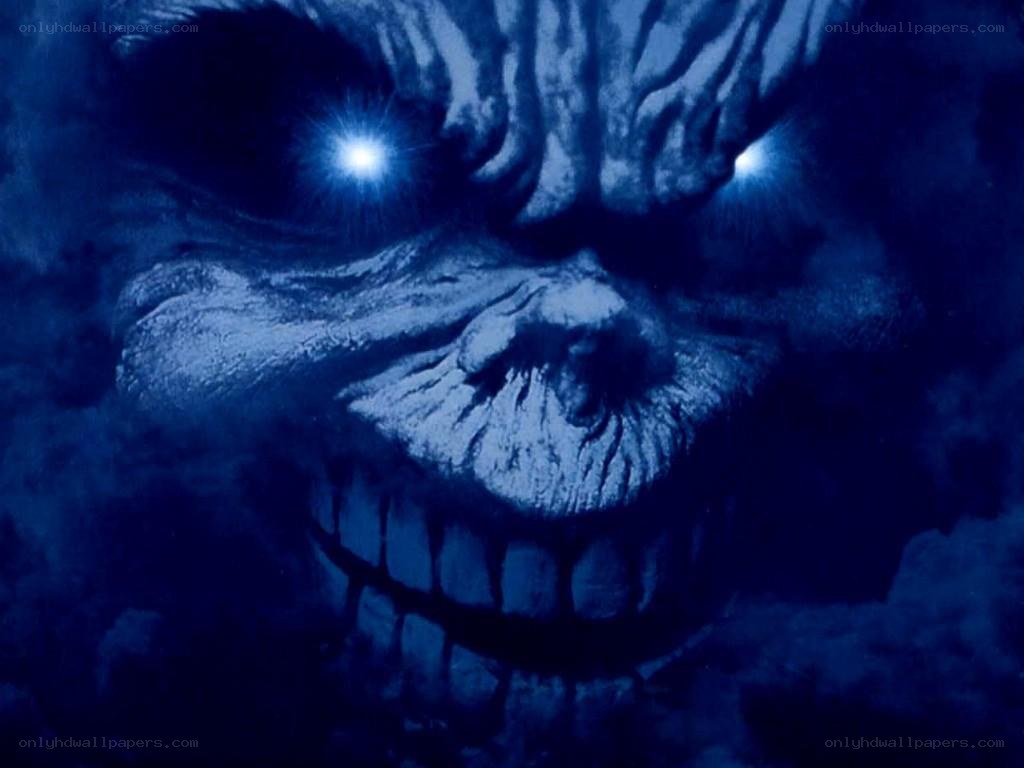 skeletal face with glowing eyes