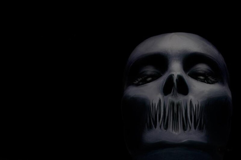 skeletal face with long teeth