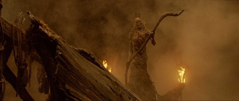 skeletal figure in smoky ruin