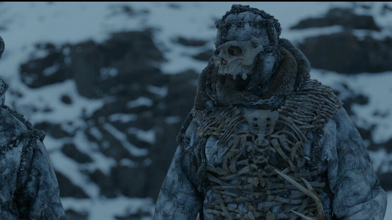 skeletal figure in snowy landscape