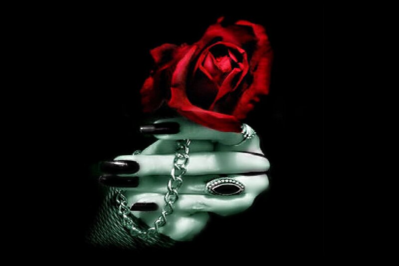 Skeletal Hand Holding Rose