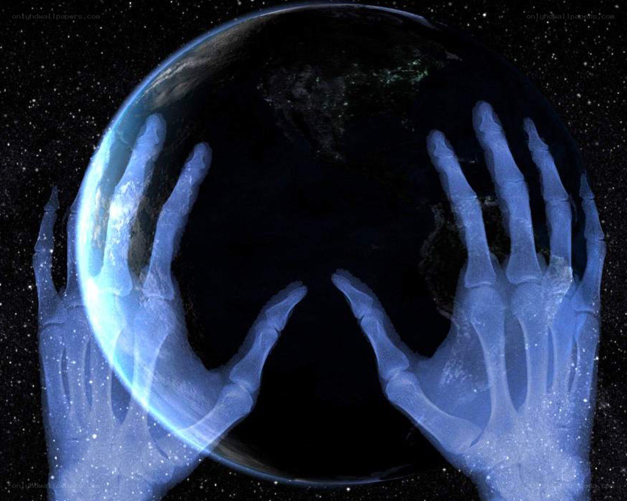 skeletal hands holding earth