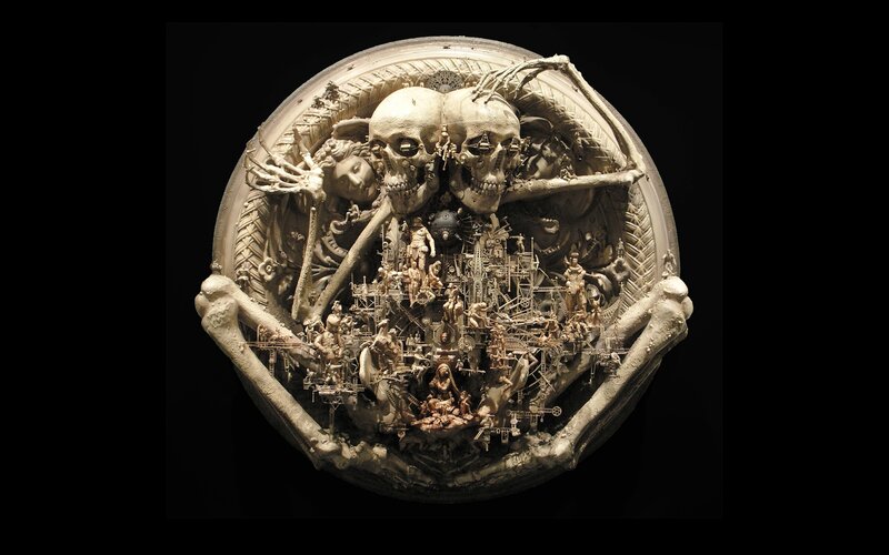 Skeletal sculpture with mechanical city