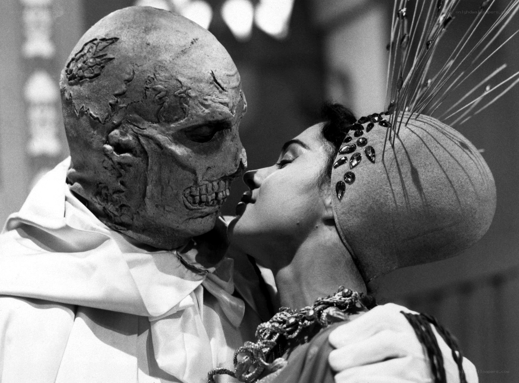 skeleton and woman in dramatic pose