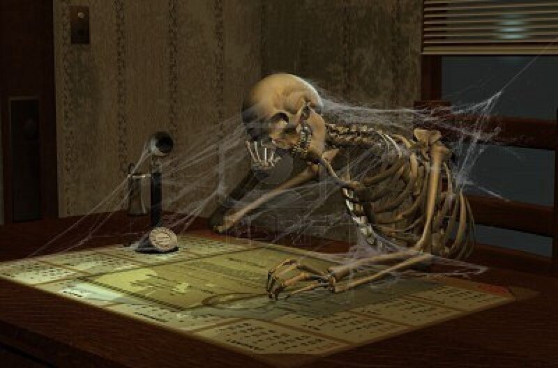 Skeleton at a Desk — Brown