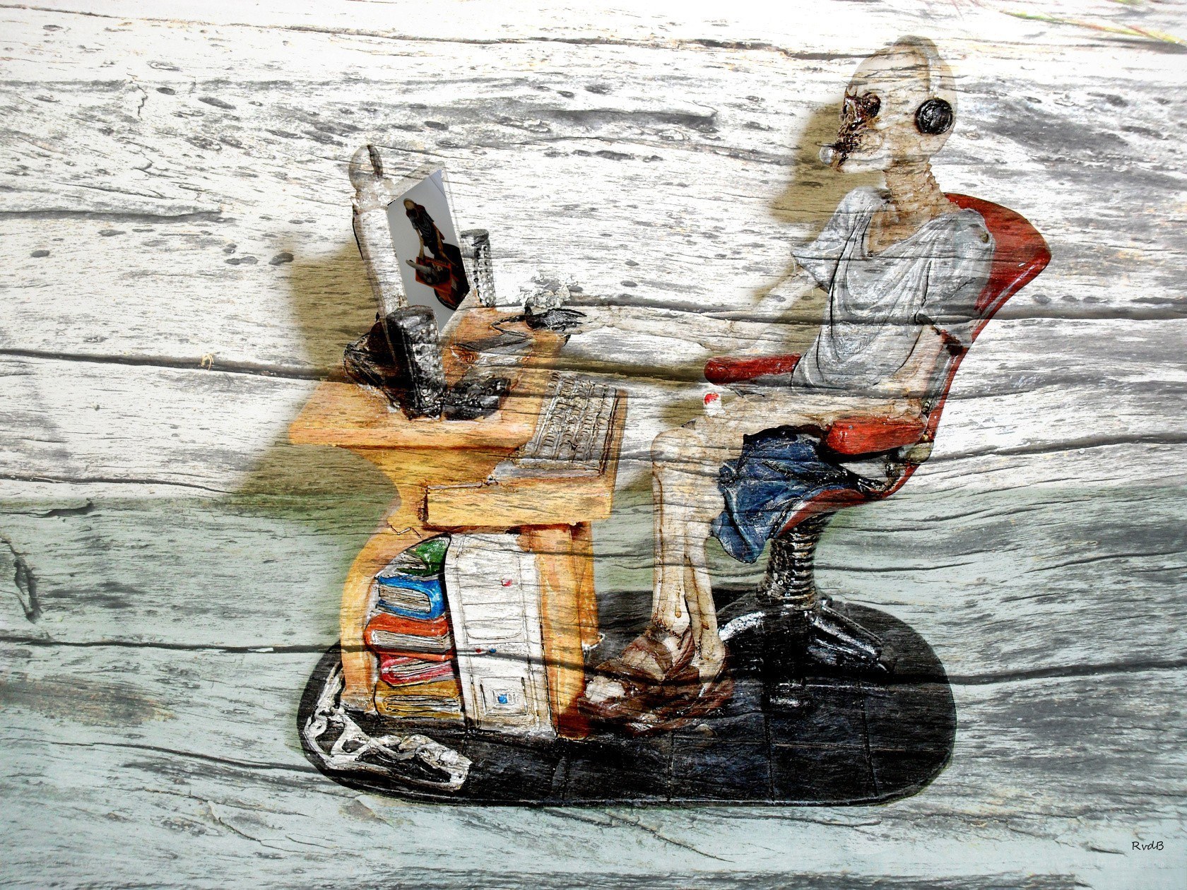skeleton at a desk