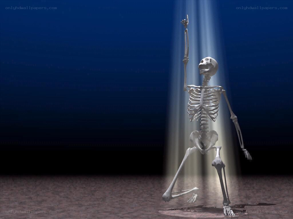 skeleton dancing under spotlight