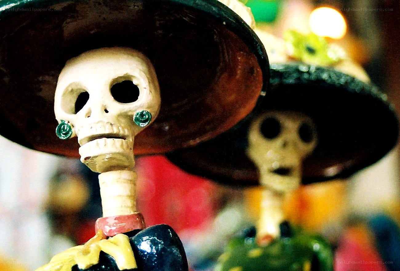 skeleton figurines with sombreros