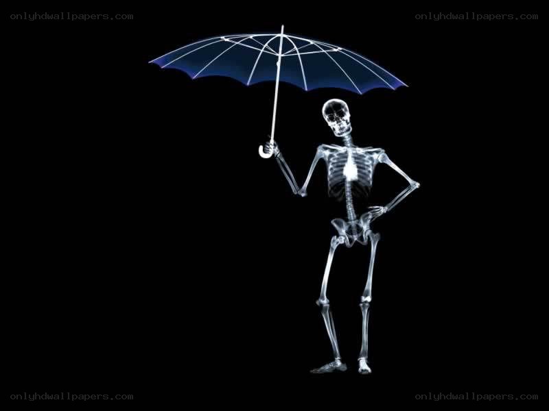 skeleton holding an umbrella