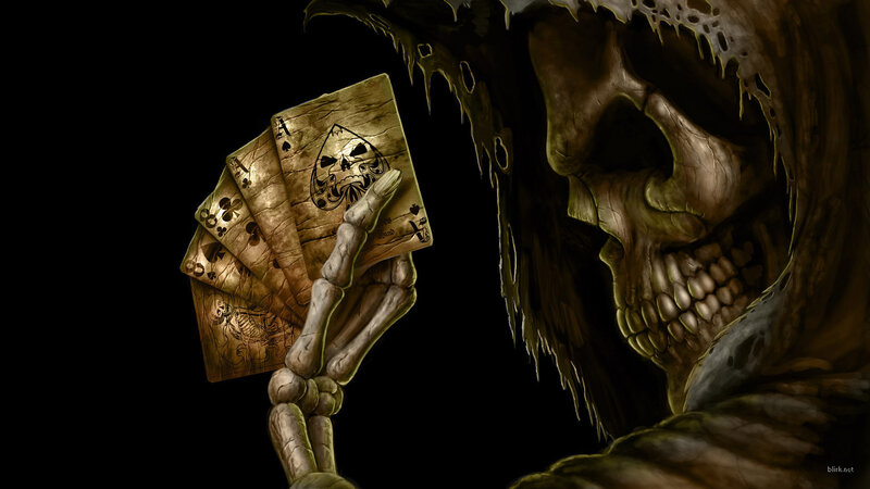 skeleton holding playing cards