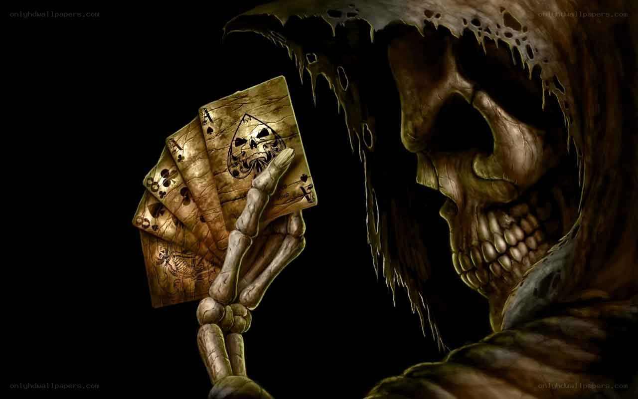 skeleton holding playing cards