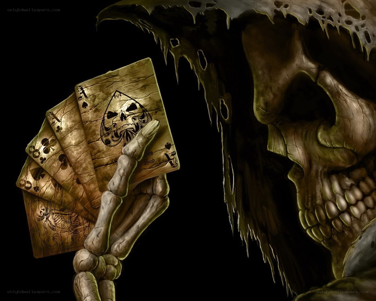 skeleton holding playing cards