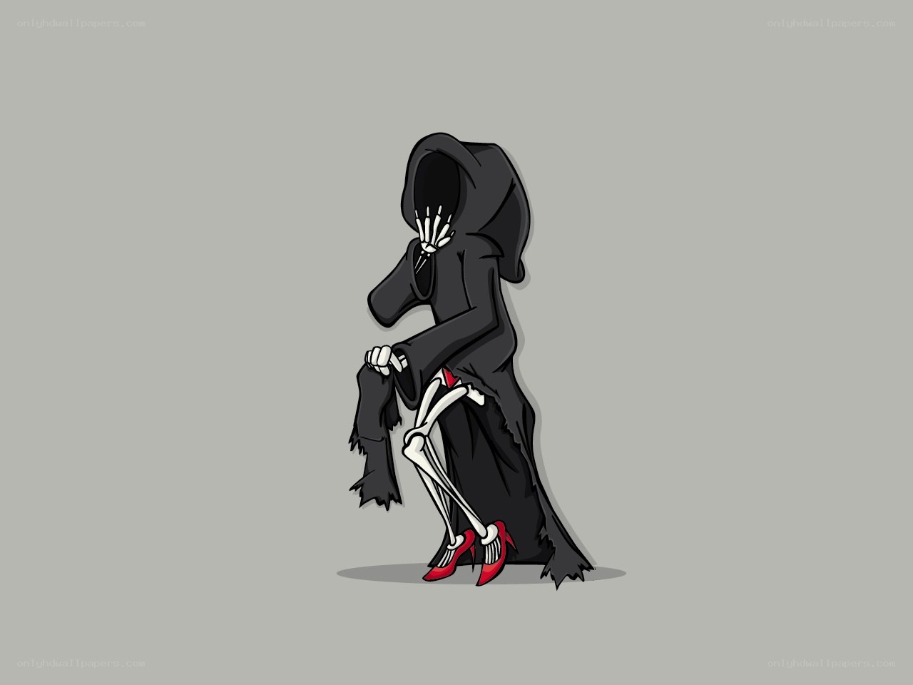 skeleton in a black cloak