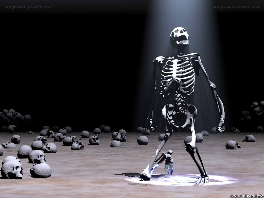 skeleton on a stage with skulls