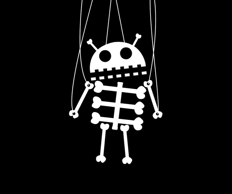 skeleton puppet on strings