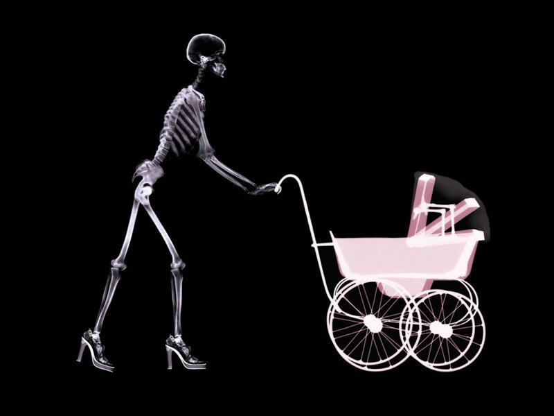 skeleton pushing a baby carriage