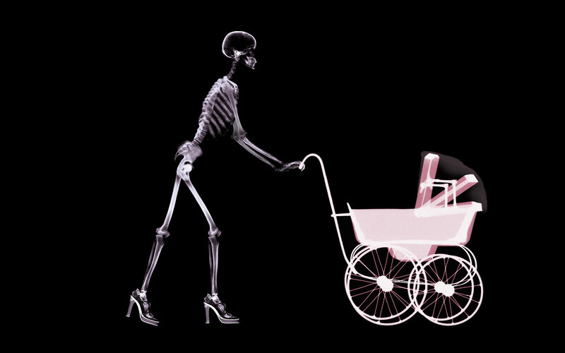 skeleton pushing a stroller