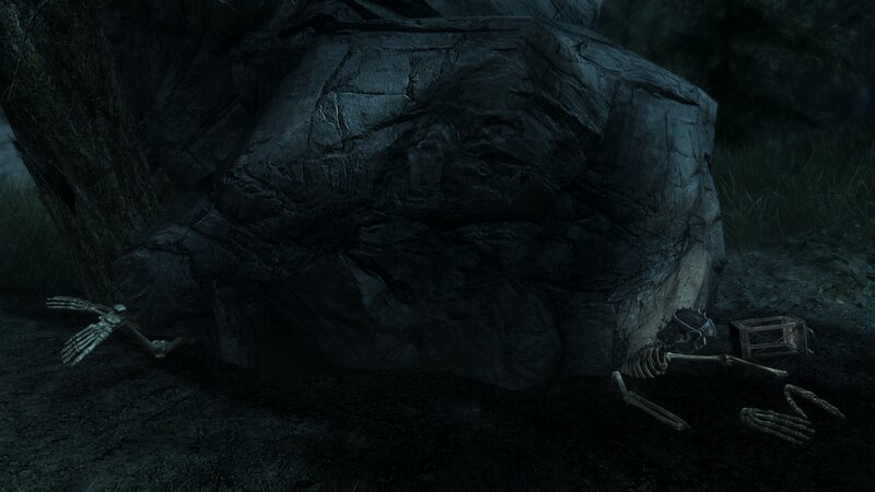Skeleton Remains under Rock