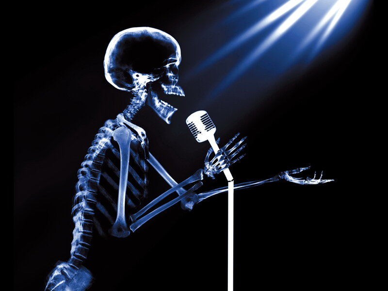 Skeleton Singing into Microphone — Blue