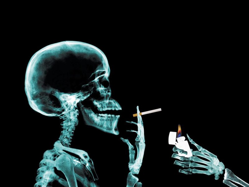 skeleton smoking cigarette