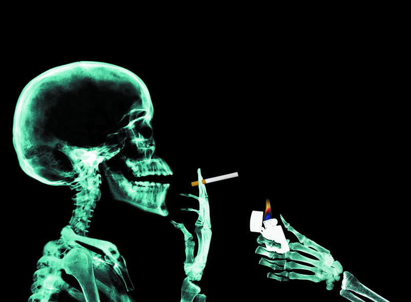 skeleton smoking cigarette