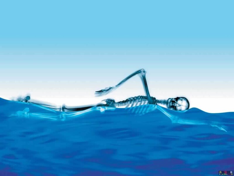 skeleton swimming underwater