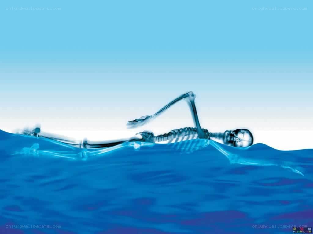 skeleton swimming underwater