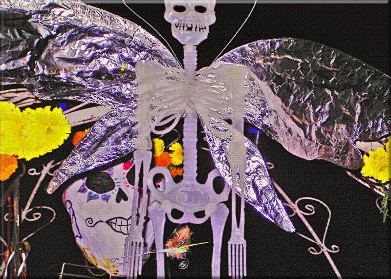skeleton with foil wings and marigolds