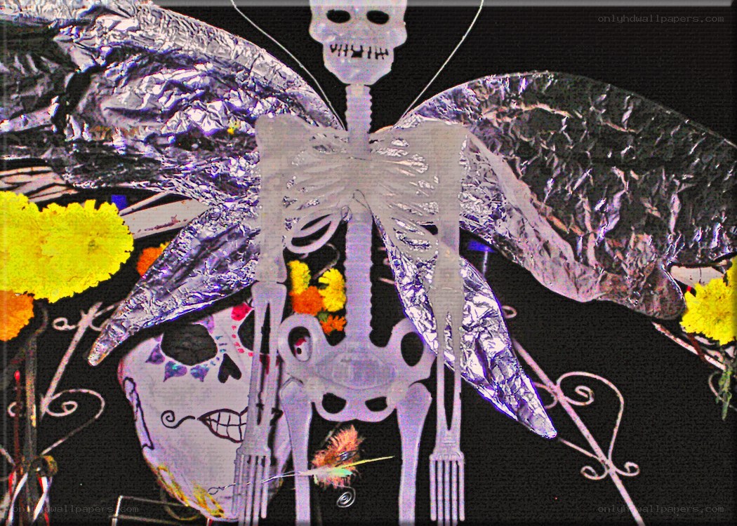 skeleton with foil wings and marigolds