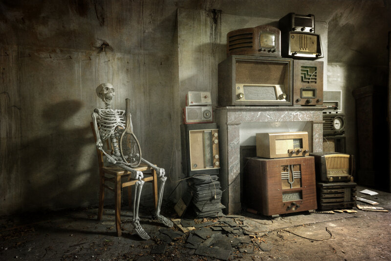 Skeleton with Tennis Racket