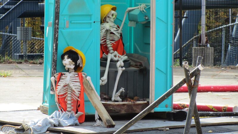 Skeletons in Porta-potty