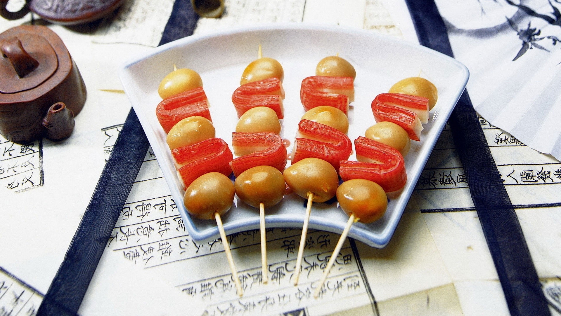Skewered crab sticks and olives