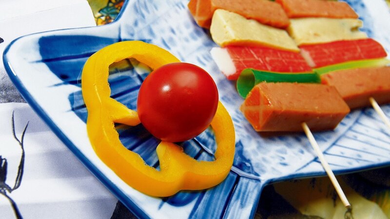 Skewered food with tomato and pepper