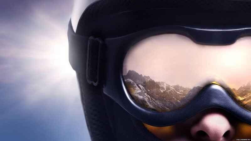 Ski goggles with mountain reflection