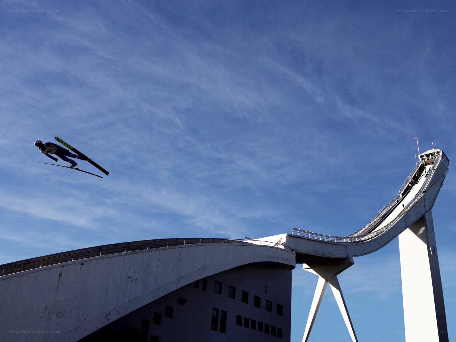 Ski jumper in mid-air