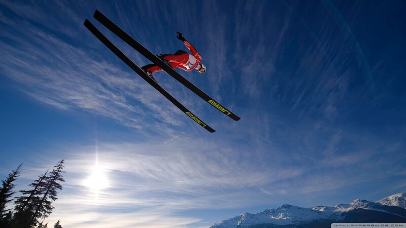 Ski Jumper in Mid-air — Blue