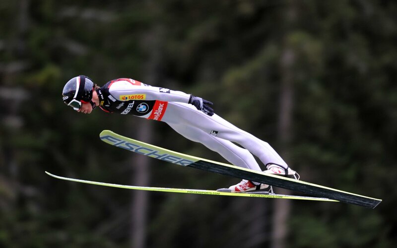Ski Jumper in Mid-air — White