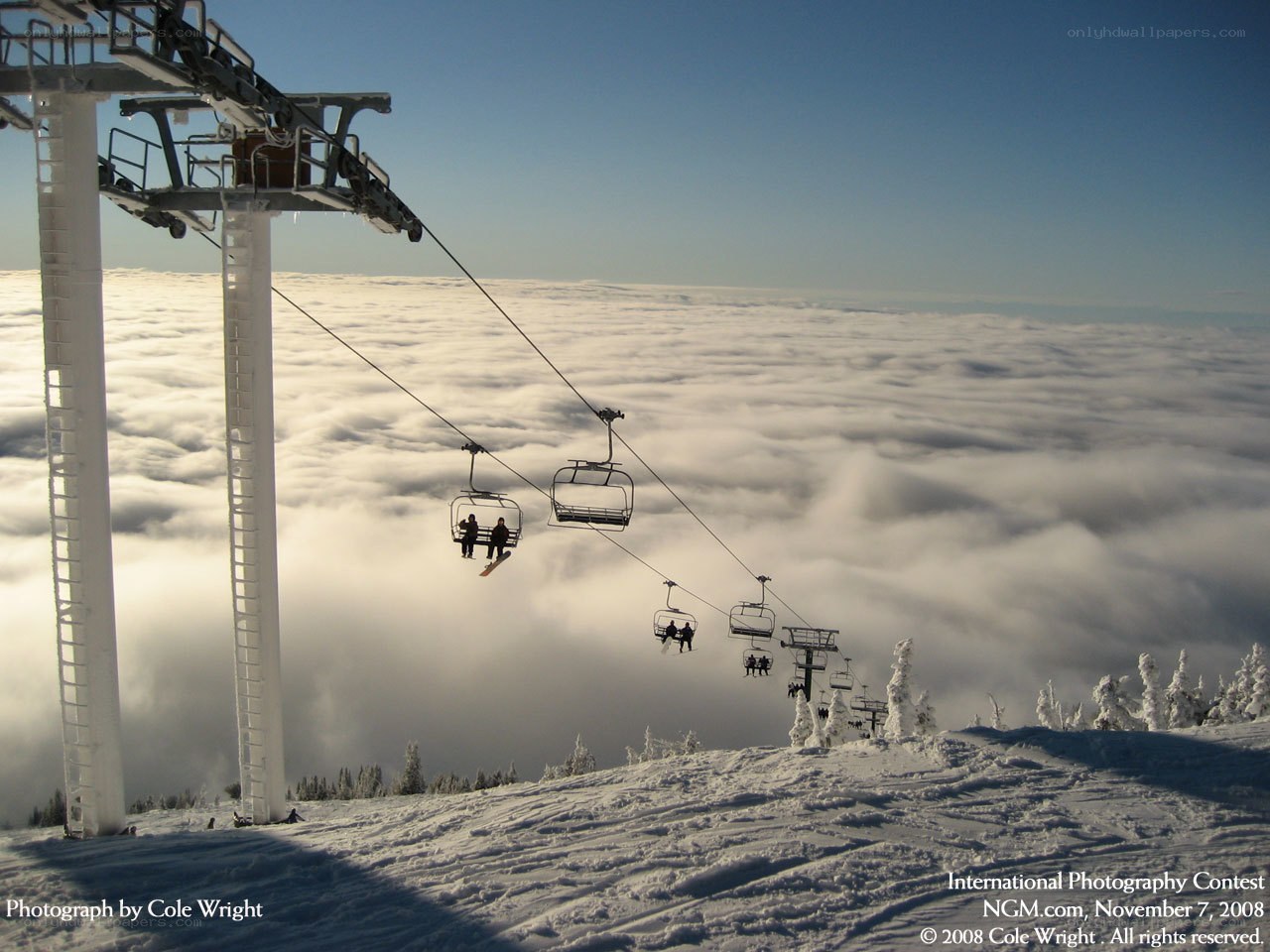 Ski lift above the clouds