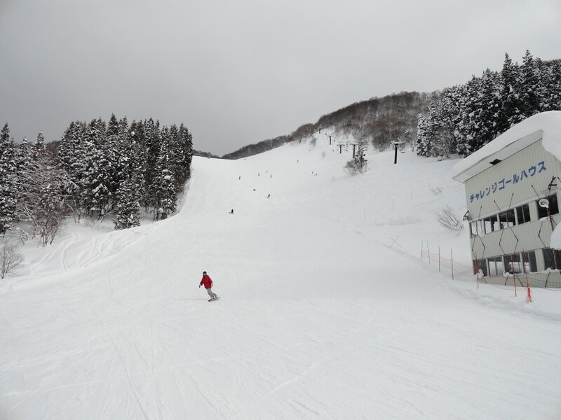 Ski resort with snowboarder