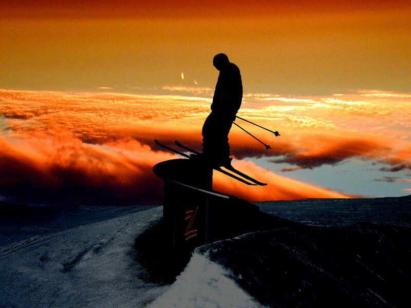 Skier at sunset on ramp
