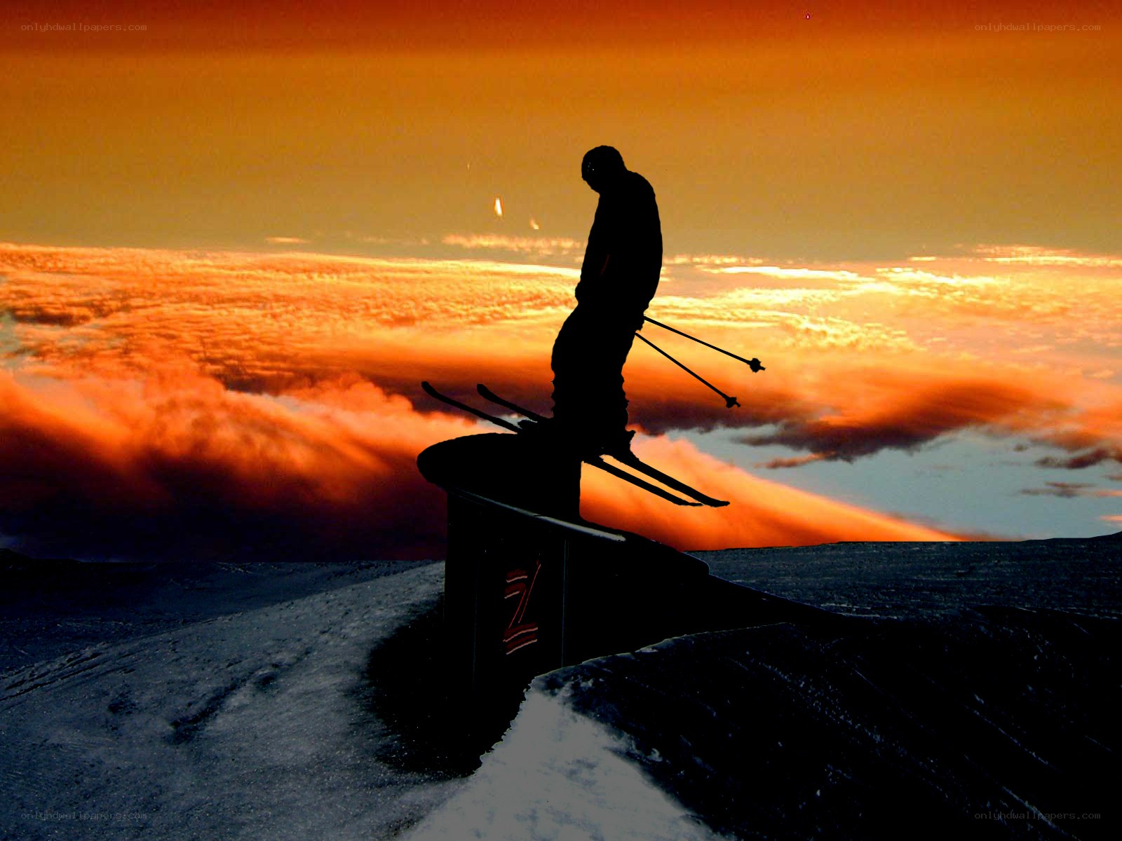 Skier at sunset on ramp