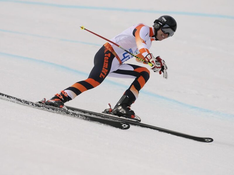 Skier in Action — White, Focused