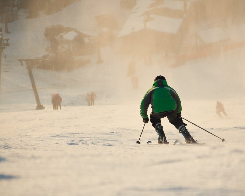 Skier in Green Jacket — White, Active, Winter, Photograph