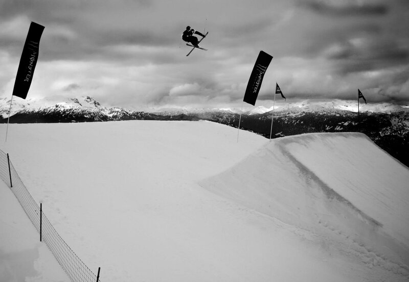Skier in Mid-air Jump — Black, Dramatic