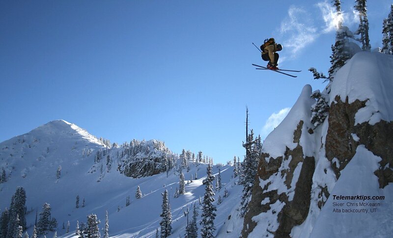 Skier in Mid-air Jump — Blue, Dramatic, Winter, Photograph, Snow-covered Mountains