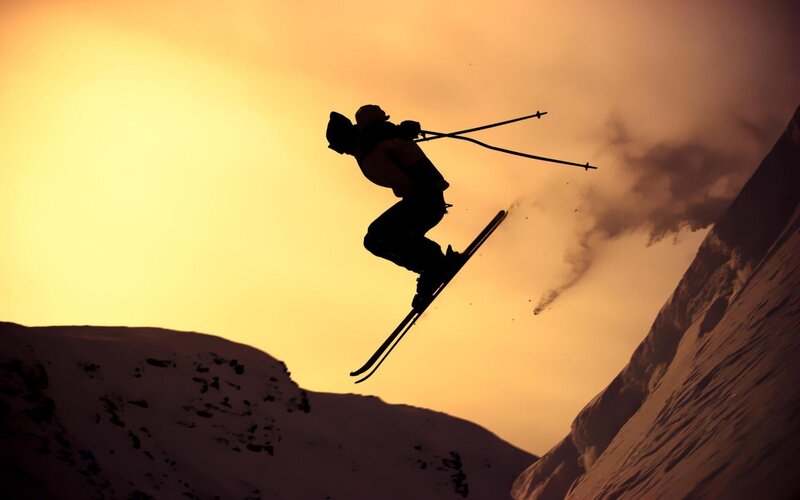 Skier in Mid-air Jump — Orange, Dramatic, Sunset